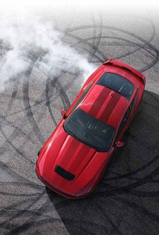 Overhead view of a 2024 Ford Mustang® model with tire tracks on pavement | York Ford Sales in Houlton ME